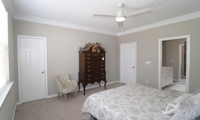 bedroom featuring baseboards, ornamental molding, light carpet, and a textured ceiling