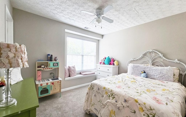 bedroom featuring visible vents, ceiling fan, carpet, and baseboards