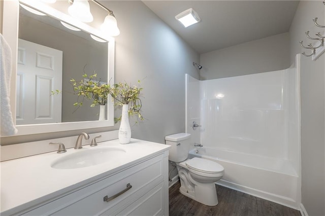 4408 Brandon Ct NE, Marietta, GA 30066 - full bathroom featuring toilet, vanity, shower / bath combination, and wood finished floors