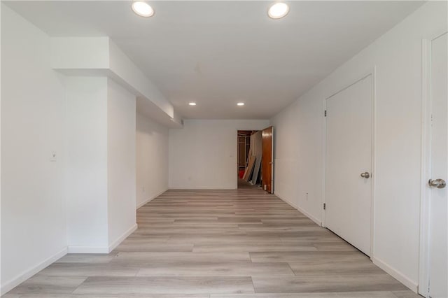 4408 Brandon Ct NE, Marietta, GA 30066 - below grade area with recessed lighting, light wood finished floors, and baseboards
