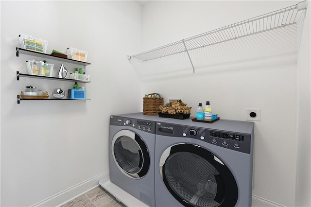 784 Keystone Dr, Woodstock, GA 30188 - washroom featuring baseboards and washing machine and dryer