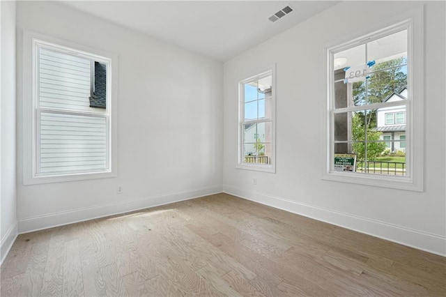 784 Keystone Dr, Woodstock, GA 30188 - unfurnished room featuring light wood finished floors and baseboards