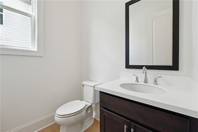 784 Keystone Dr, Woodstock, GA 30188 - bathroom featuring toilet, vanity, and baseboards