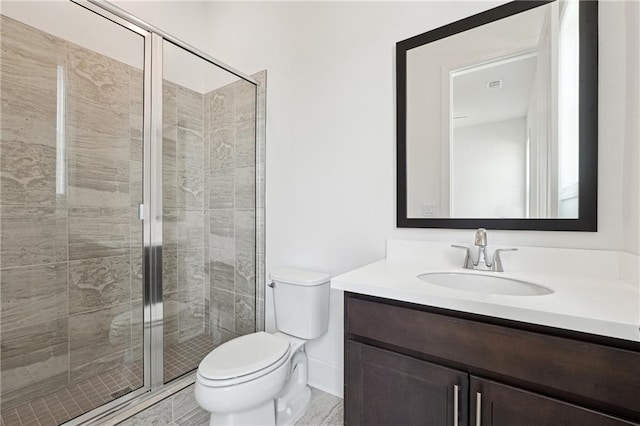 784 Keystone Dr, Woodstock, GA 30188 - bathroom featuring toilet, a shower stall, and vanity