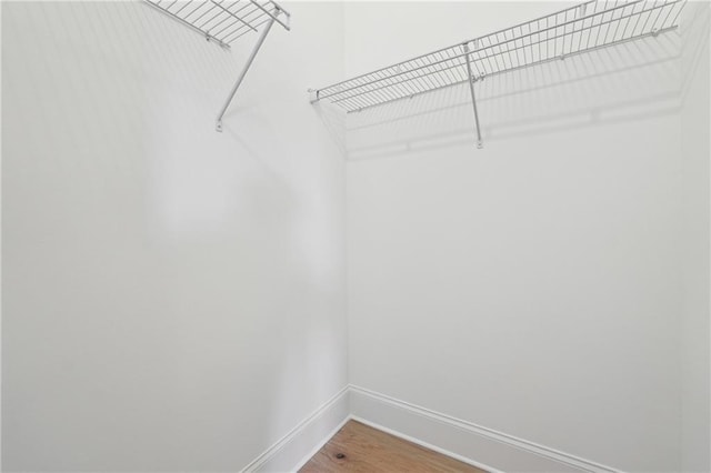 784 Keystone Dr, Woodstock, GA 30188 - spacious closet featuring wood finished floors