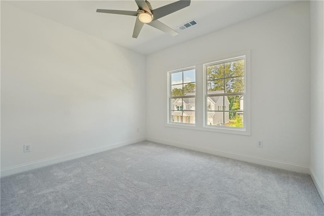 784 Keystone Dr, Woodstock, GA 30188 - spare room with light carpet, baseboards, and ceiling fan