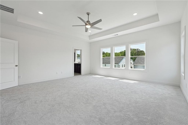 784 Keystone Dr, Woodstock, GA 30188 - empty room featuring a raised ceiling, ceiling fan, light carpet, recessed lighting, and baseboards