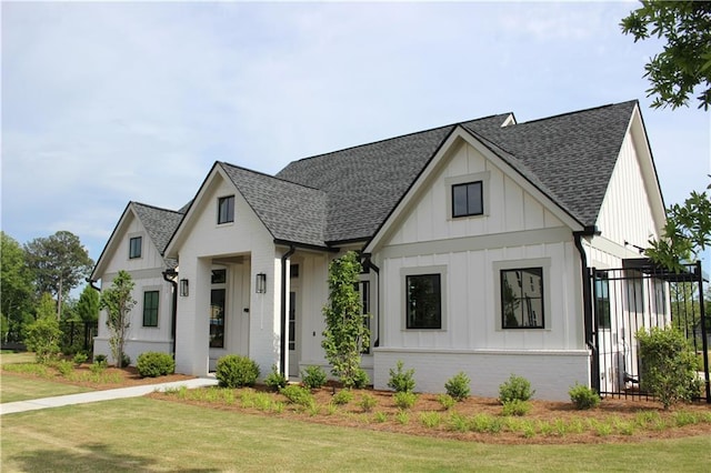 784 Keystone Dr, Woodstock, GA 30188 - modern farmhouse style home with a shingled roof and board and batten siding