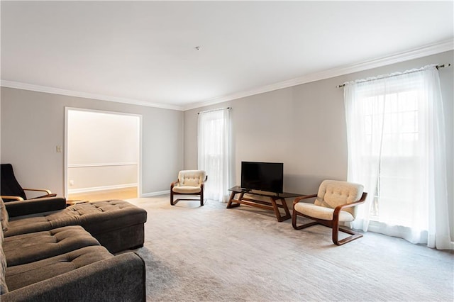 living room with light carpet and crown molding