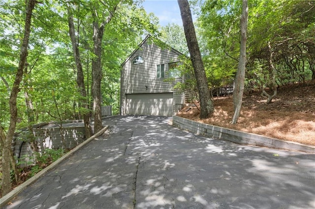 exterior space featuring a garage