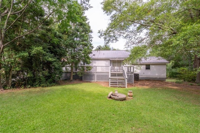 view of yard featuring a deck