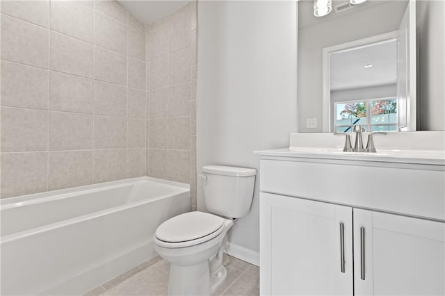 full bathroom featuring vanity, toilet, tile patterned floors, and tiled shower / bath