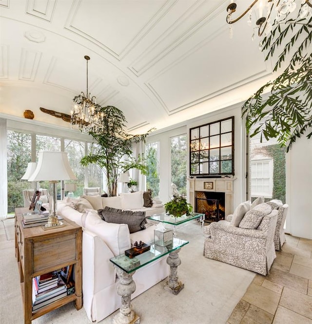 living room featuring an inviting chandelier and light tile patterned floors