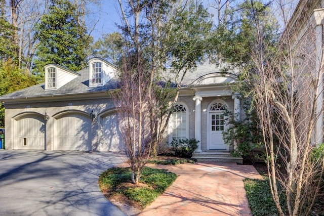 view of front of property featuring a garage