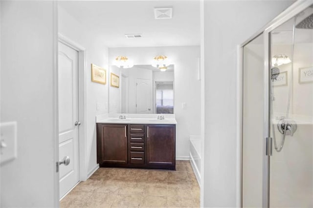 bathroom featuring vanity and plus walk in shower