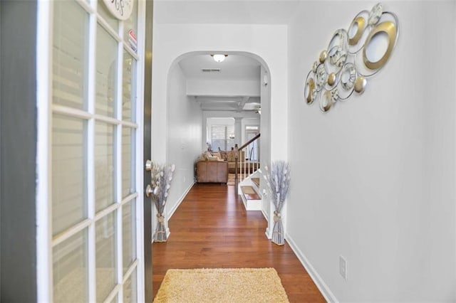 corridor featuring dark wood-type flooring