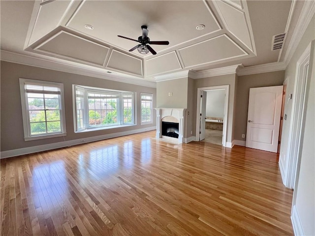 unfurnished living room featuring coffered ceiling, hardwood / wood-style flooring, ornamental molding, and ceiling fan