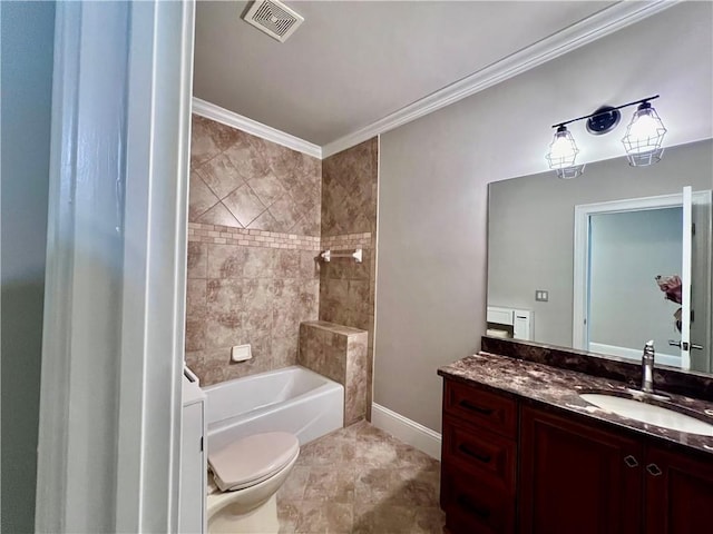 full bathroom with ornamental molding, toilet, tiled shower / bath combo, and vanity