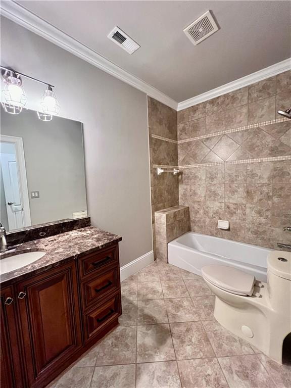 full bathroom with vanity, tiled shower / bath, crown molding, and toilet