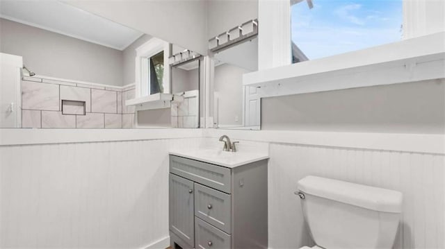 bathroom featuring vanity and toilet