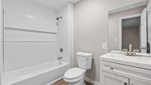 full bathroom with shower / tub combination, hardwood / wood-style floors, vanity, and toilet