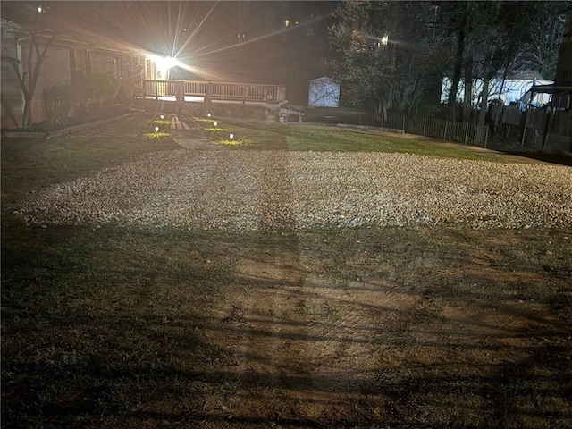 view of yard with a wooden deck