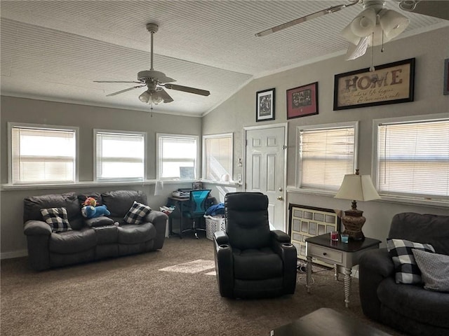 carpeted living room with lofted ceiling, ceiling fan, and ornamental molding