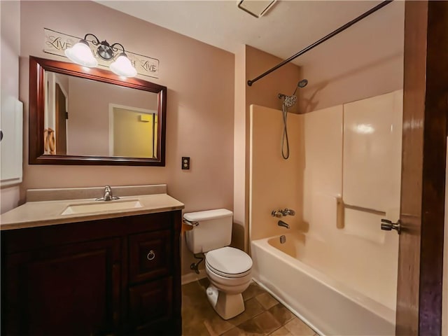 bathroom featuring toilet, shower / bathtub combination, tile patterned floors, and vanity