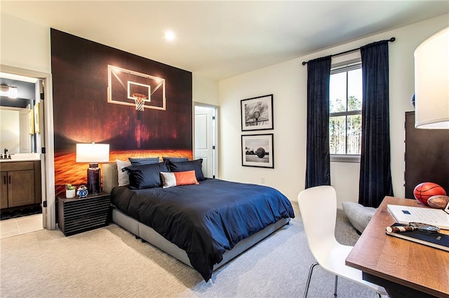 carpeted bedroom featuring connected bathroom