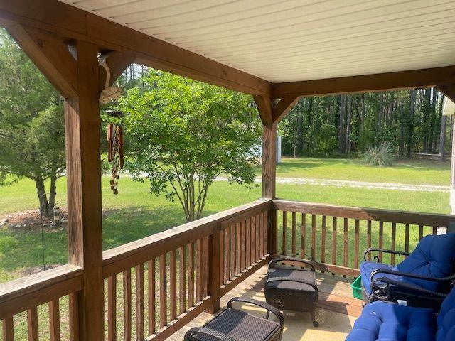 1167 Underwood Rd, Sparta, GA 31087 - wooden terrace featuring a yard