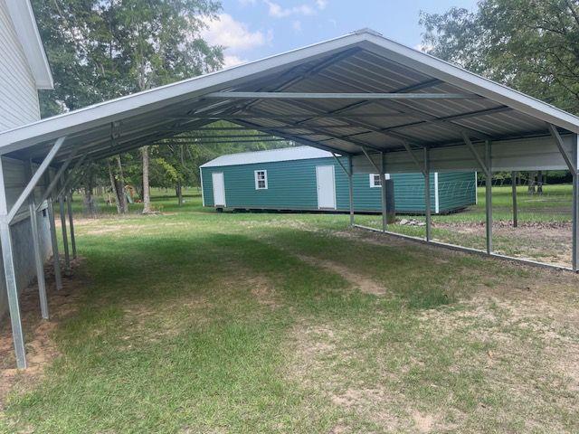1167 Underwood Rd, Sparta, GA 31087 - view of car parking featuring a detached carport