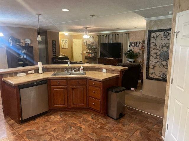 1167 Underwood Rd, Sparta, GA 31087 - kitchen with stainless steel dishwasher, a sink, crown molding, light countertops, and brown cabinets