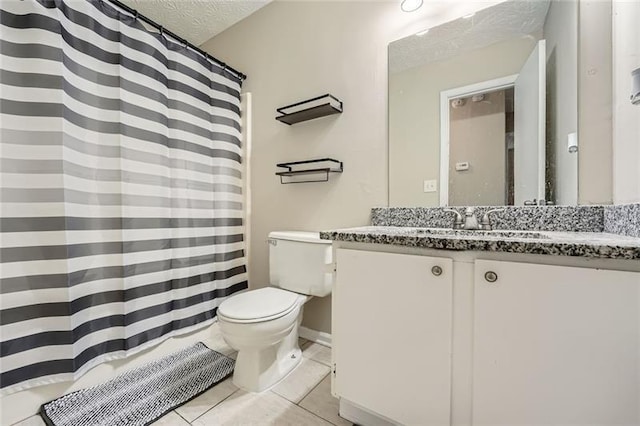 840 Wells Cir SE, Smyrna, GA 30080 - bathroom featuring a textured ceiling, toilet, vanity, tile patterned floors, and a shower with shower curtain