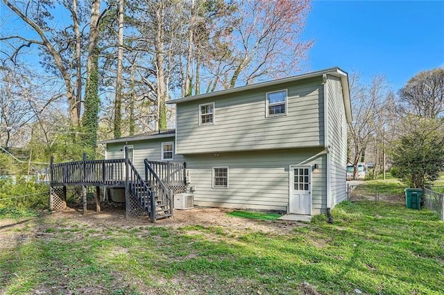 840 Wells Cir SE, Smyrna, GA 30080 - rear view of house with stairway and a wooden deck