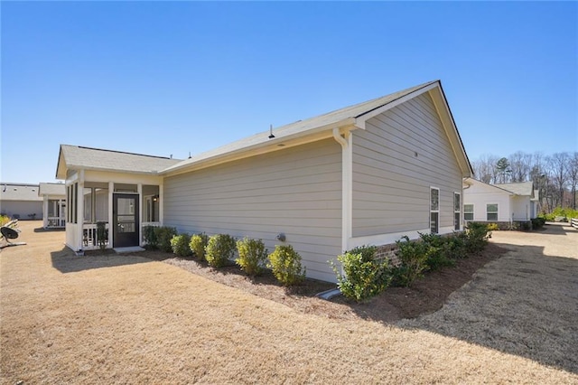 exterior space with a sunroom