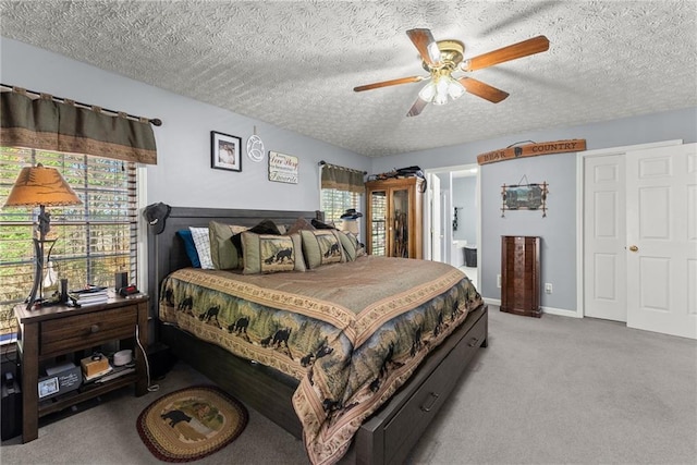305 Mountain Brook Rd, Dawsonville, GA 30534 - bedroom with light colored carpet, a textured ceiling, ensuite bath, and a ceiling fan