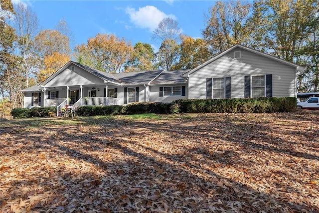 305 Mountain Brook Rd, Dawsonville, GA 30534 - ranch-style home featuring a porch