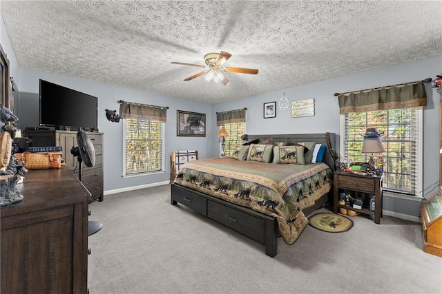 305 Mountain Brook Rd, Dawsonville, GA 30534 - bedroom with carpet, a textured ceiling, baseboards, and a ceiling fan