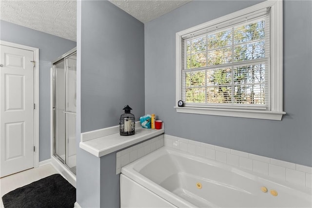 305 Mountain Brook Rd, Dawsonville, GA 30534 - full bathroom featuring a textured ceiling, a whirlpool tub, and a stall shower