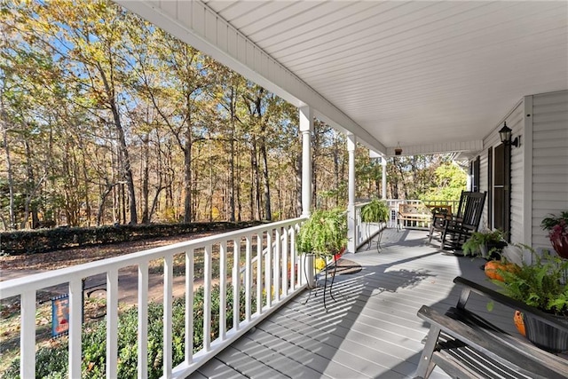 305 Mountain Brook Rd, Dawsonville, GA 30534 - wooden terrace featuring covered porch