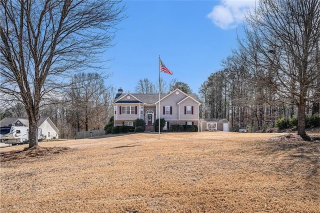 split foyer home with a front yard