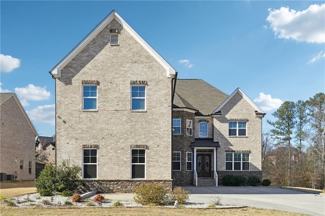 view of front of property with brick siding