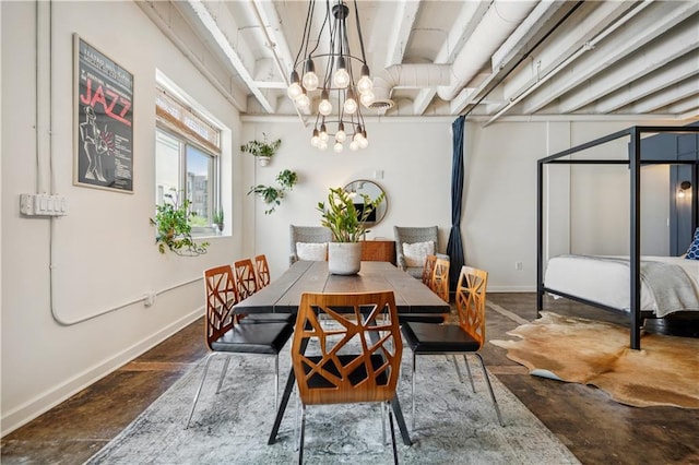 dining space with beam ceiling and an inviting chandelier