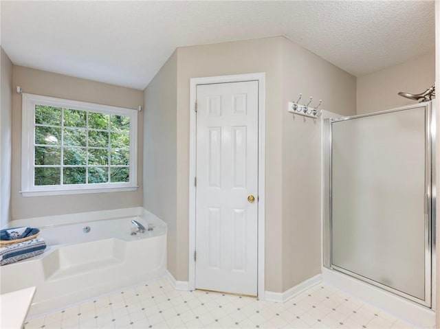 5020 Bayberry Dr, Cumming, GA 30040 - bathroom featuring a stall shower, a bath, and tile patterned floors