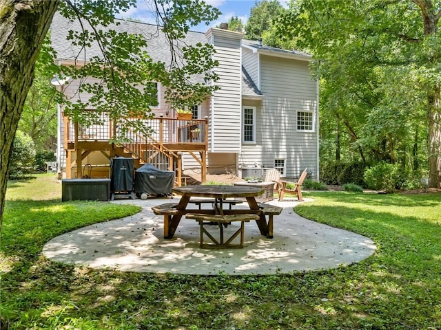 5020 Bayberry Dr, Cumming, GA 30040 - rear view of property featuring a patio, a shingled roof, and a lawn
