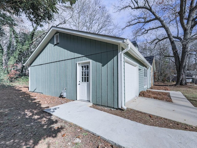 view of outbuilding featuring a garage