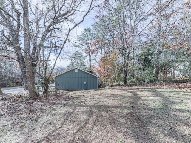 view of home's exterior featuring an outbuilding