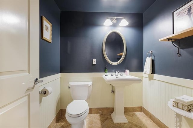 bathroom featuring toilet