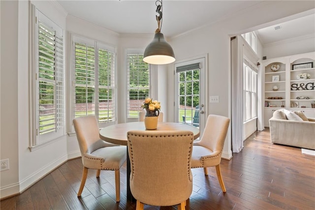 410 Longwood Ln, Alpharetta, GA 30004 - dining area with crown molding, dark wood-style flooring, and baseboards