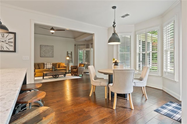410 Longwood Ln, Alpharetta, GA 30004 - dining area featuring crown molding, dark wood-type flooring, and baseboards
